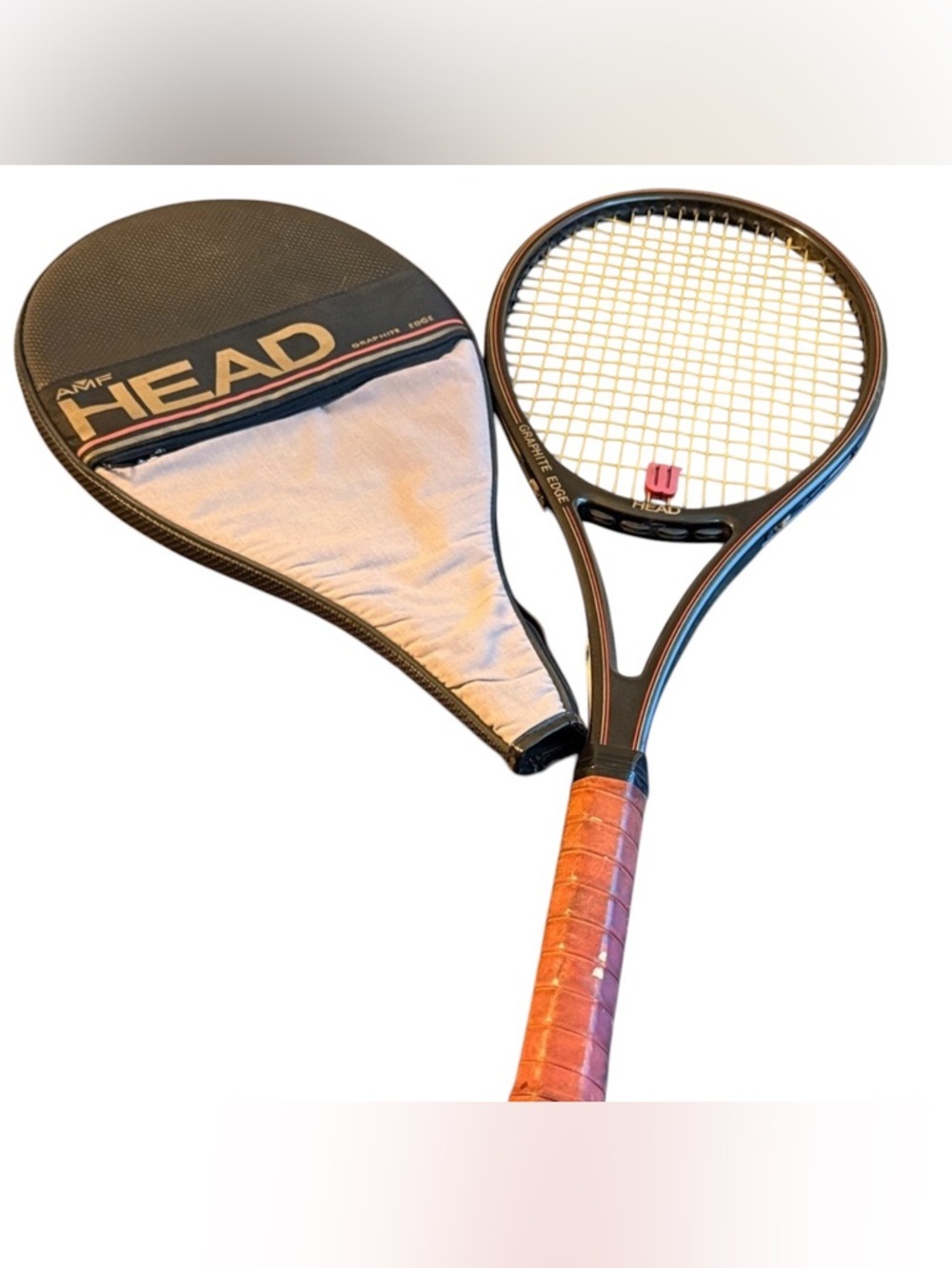 Head Vintage‎ Tennis Racket with Brown Grip  circa 1980: Model Graphite Edge